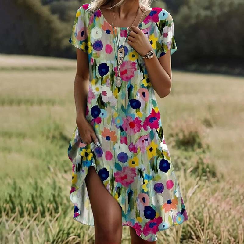 Zomerse korte damesjurk met bloemenprint en speelse flair – Florynne BloomDress - Glamorix