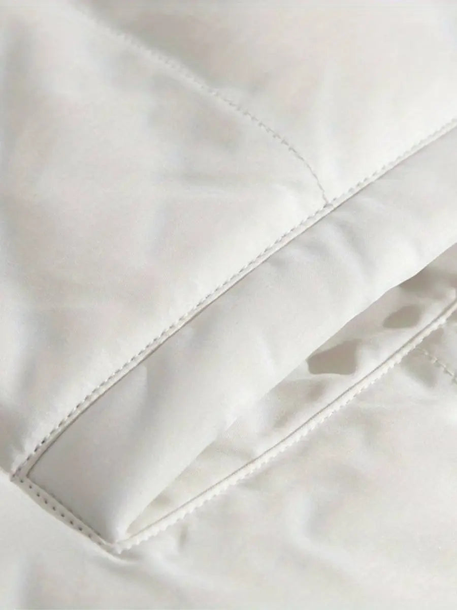 Dames winterjas met gewatteerde voering en hoge kraag, warme isolatie en moderne ritssluiting voor dames – VESTO - Glamorix