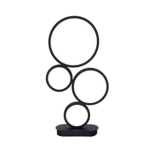 NINALUX - Eenvoudige tafellamp met gestapelde cirkelvormige voet
