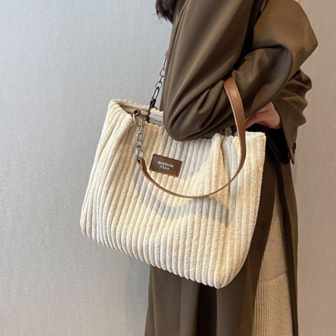 NOVA - Schattige corduroy draagtas met een speelse twist
