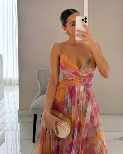 Luchtige maxi-jurk met bloemenprint en elegante details – FLORÉA - Glamorix