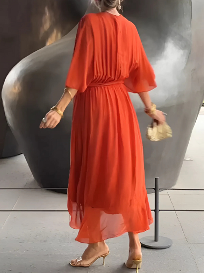 MIRENA – Midi wikkeljurk met tijdloze elegantie en vrouwelijke charme