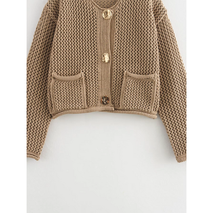 ISLA - Kaki gebreid vest met knopen en tijdloze charme