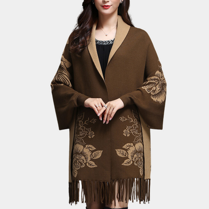 MAIA – Lang damesvest met kwastdetails en elegante flow
