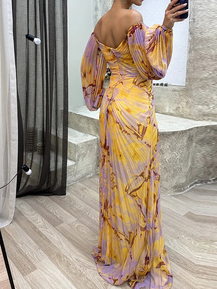 Luchtige off-shoulder maxi jurk met ballonmouwen – VELVETA - Glamorix