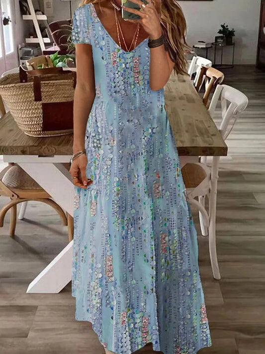 Luchtige maxi zomerjurk met V-hals en bohemian flair – ELARA VIBE - Glamorix