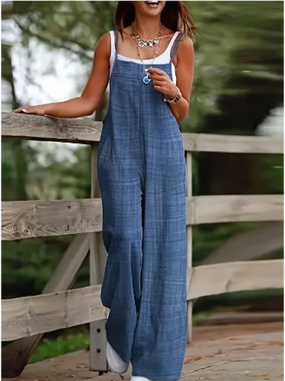 Losvallende damesjumpsuit met wijde pijpen en verstelbare schouderbanden – LINA FLOWSUIT - Glamorix
