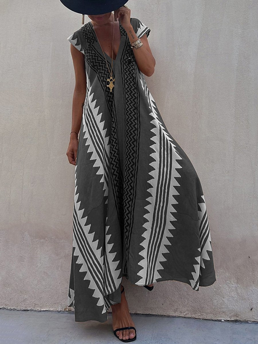 Luchtige maxi damesjurk met diepe V-hals en wijde mouwen – ALMA VIVA - Glamorix