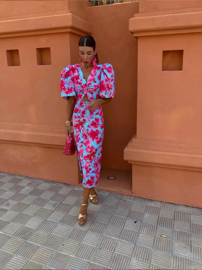 AYENNE – Midi damesjurk met pofmouwen en verfijnd cut-out detail - Glamorix