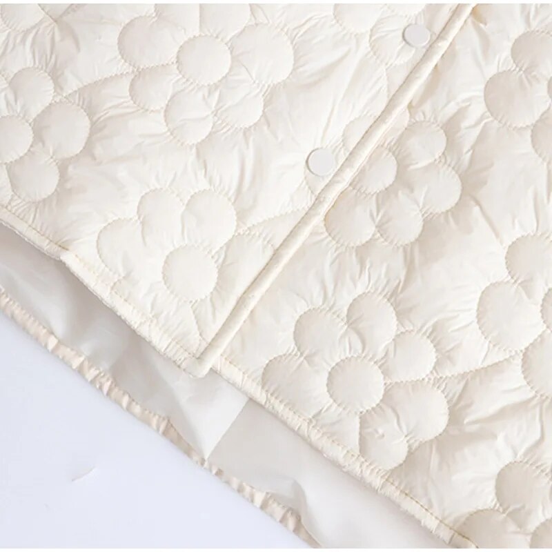 ARALYN – Dames winterjas met geperste bloemen