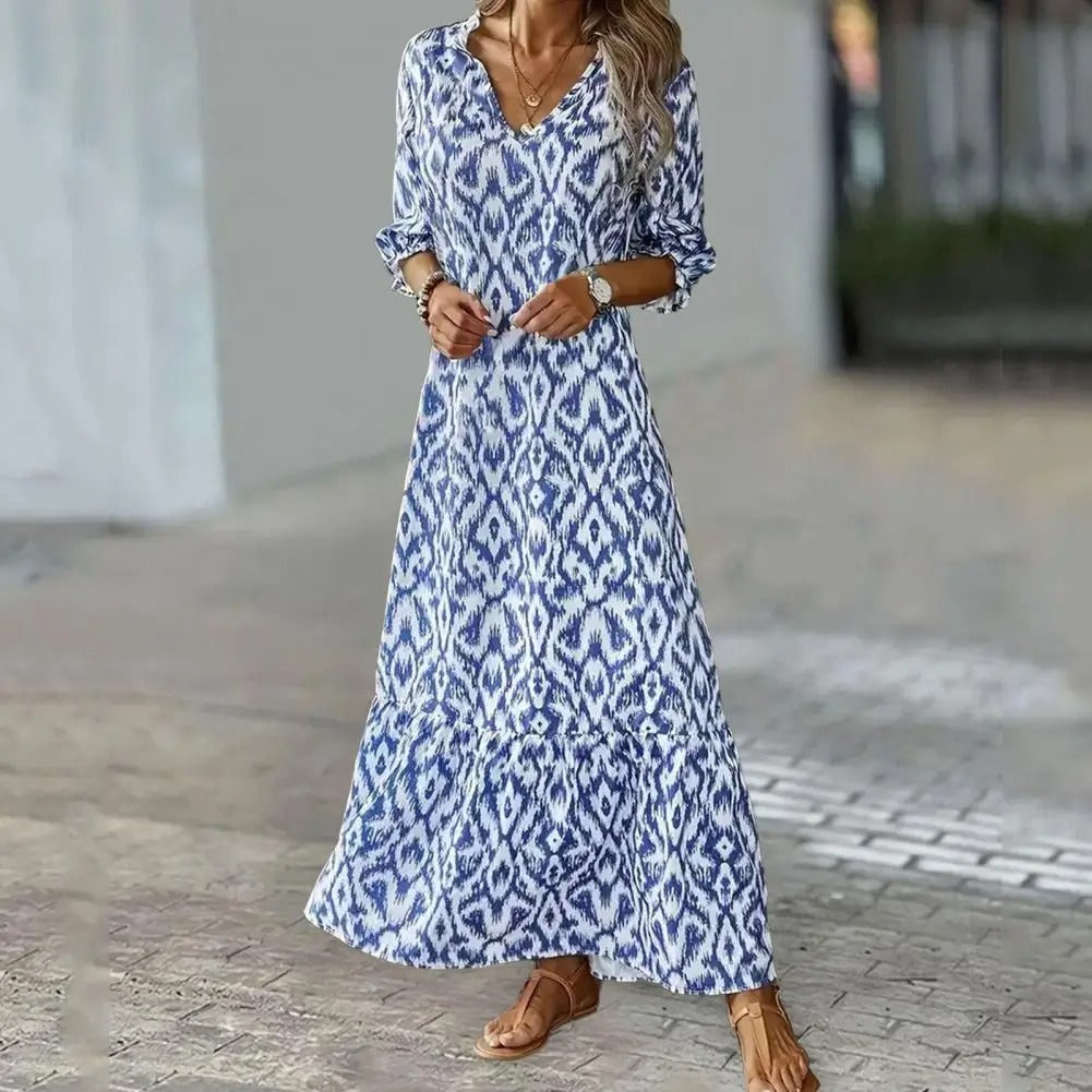 LINA - Soepelvallende maxi-jurk met patroon en lange mouwen