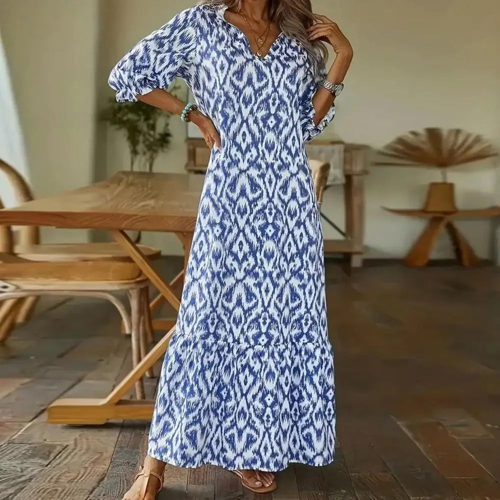 LINA - Soepelvallende maxi-jurk met patroon en lange mouwen