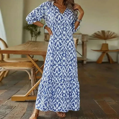 LINA - Soepelvallende maxi-jurk met patroon en lange mouwen