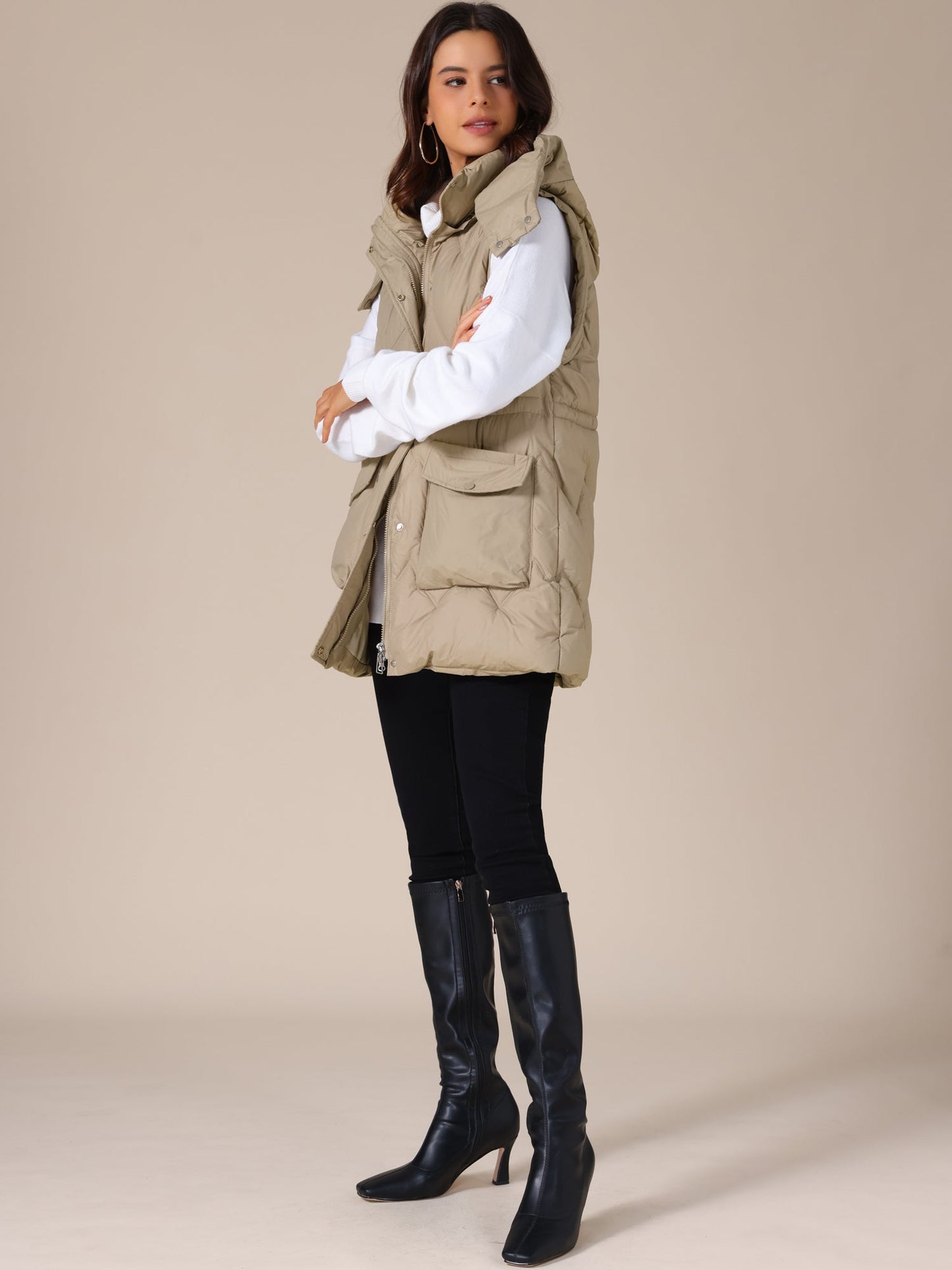 NAYLA – Lange gewatteerde dames bodywarmer met capuchon - Glamorix