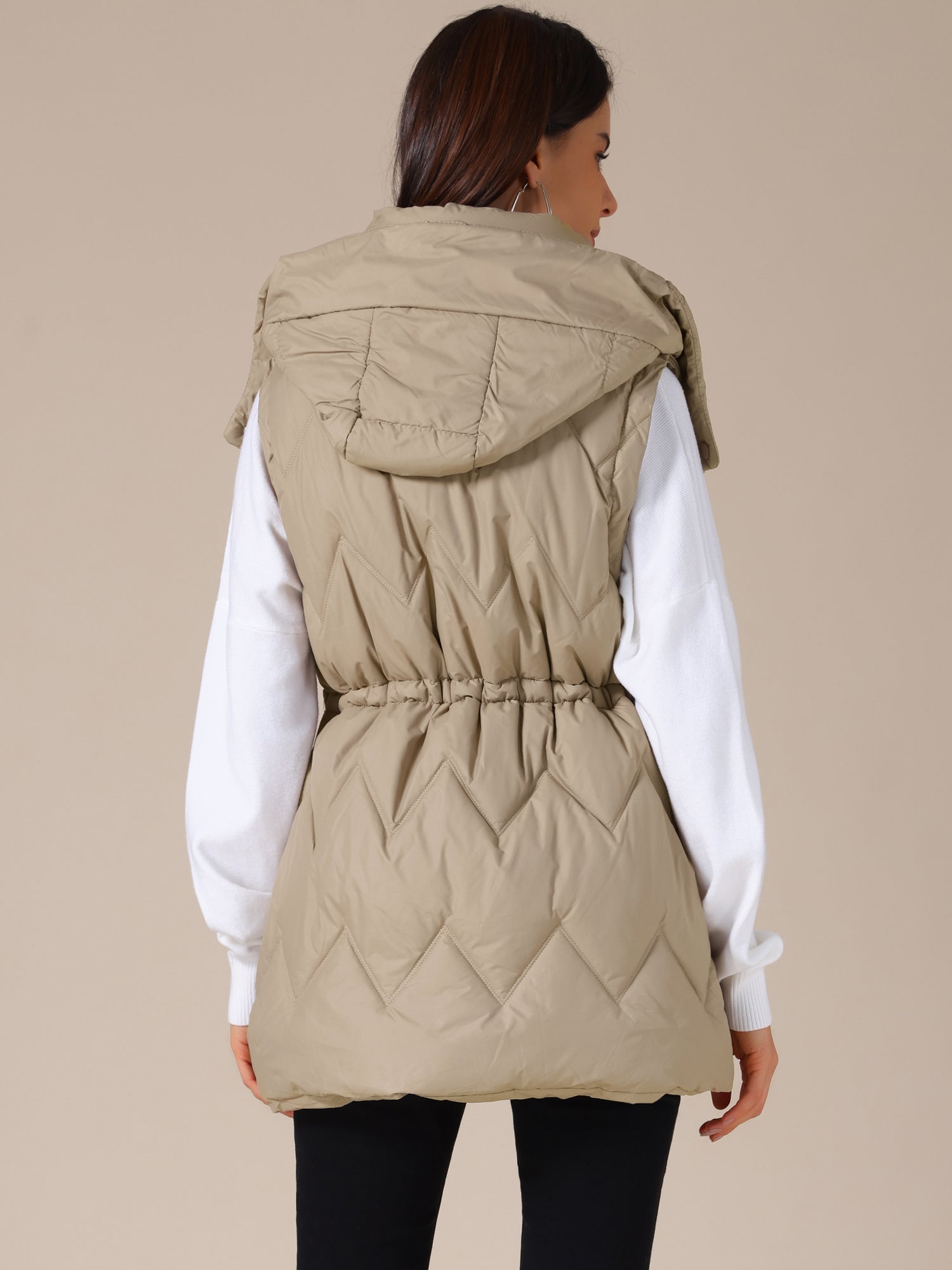 NAYLA – Lange gewatteerde dames bodywarmer met capuchon - Glamorix