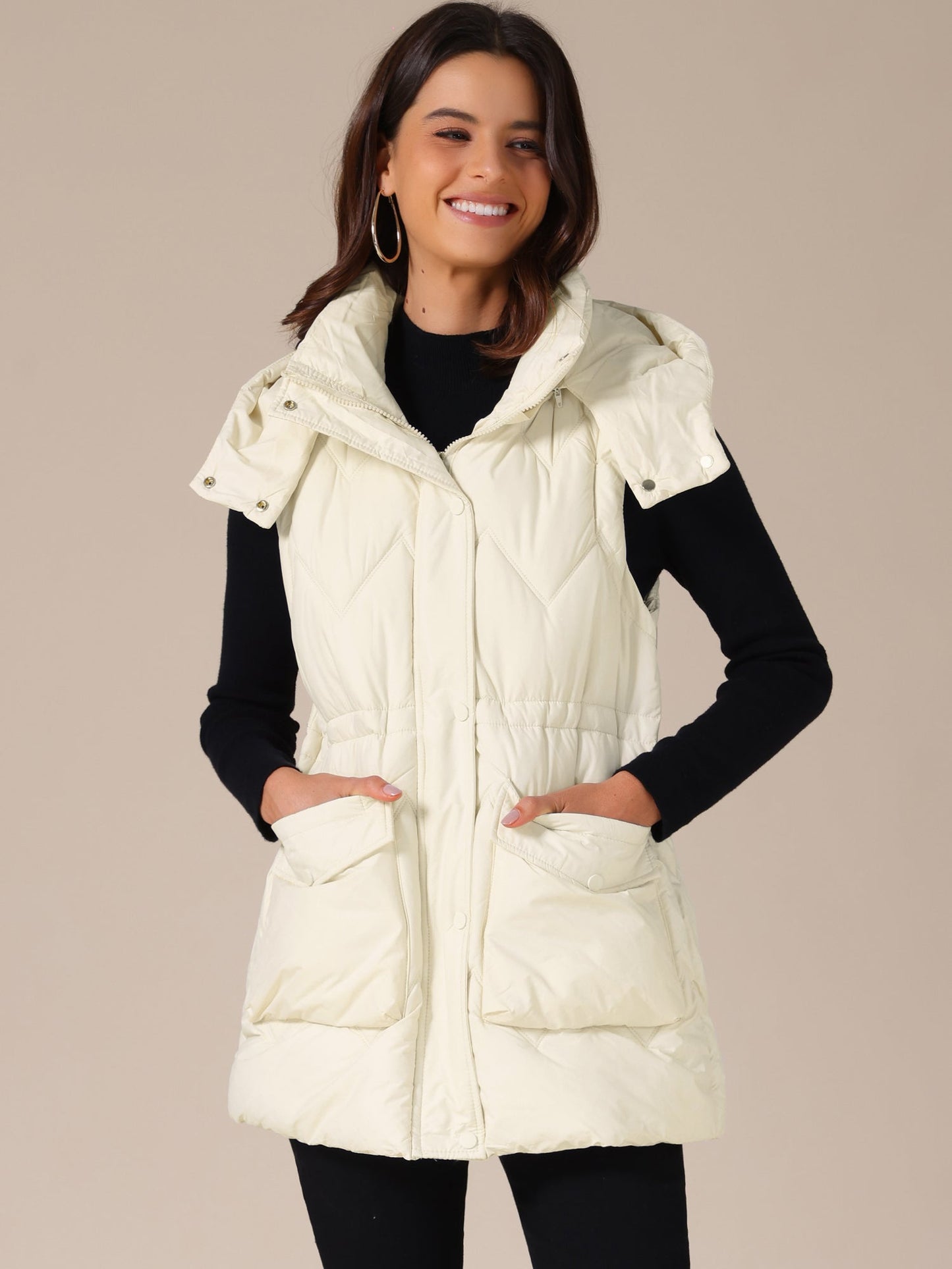NAYLA – Lange gewatteerde dames bodywarmer met capuchon - Glamorix