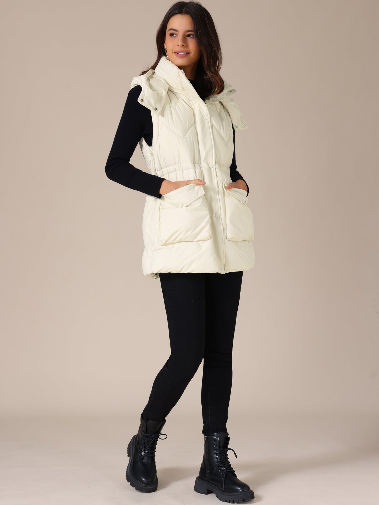 NAYLA – Lange gewatteerde dames bodywarmer met capuchon - Glamorix