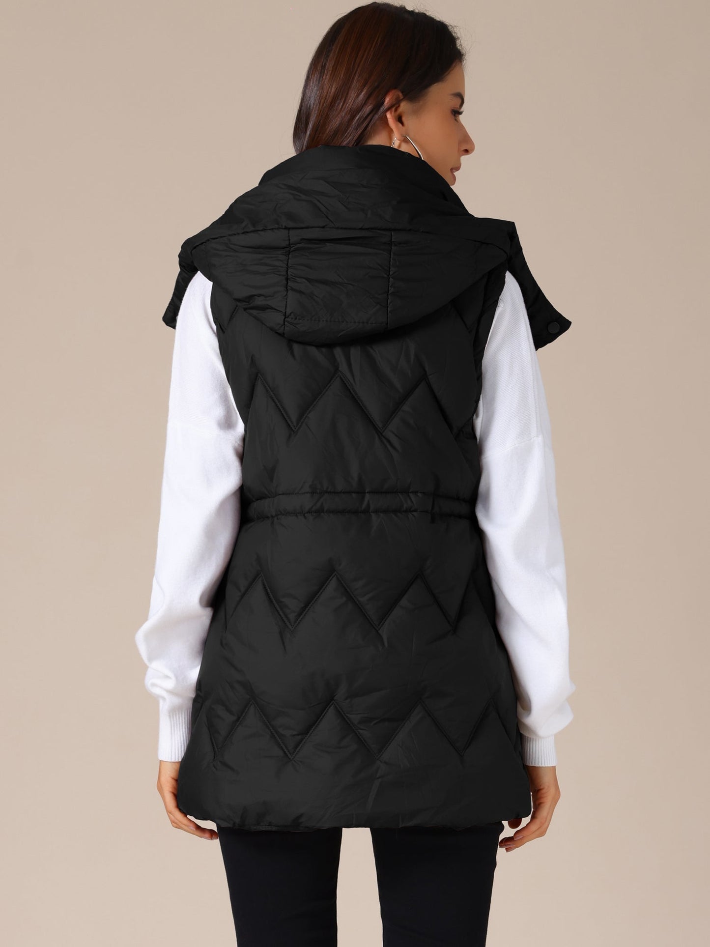 NAYLA – Lange gewatteerde dames bodywarmer met capuchon - Glamorix