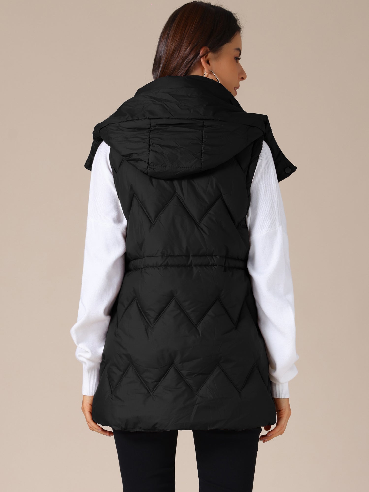 NAYLA – Lange gewatteerde dames bodywarmer met capuchon - Glamorix